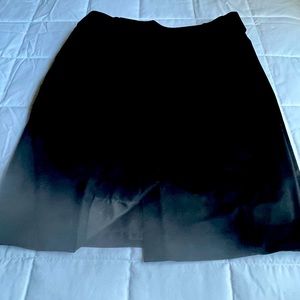 Black pencil skirt with short split in the back